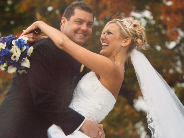 Happy Bride and Groom with Flowers