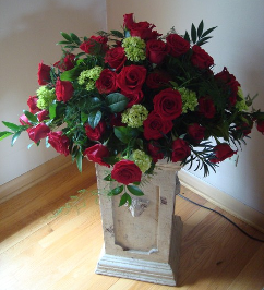 Red and Green Flowers in Vase